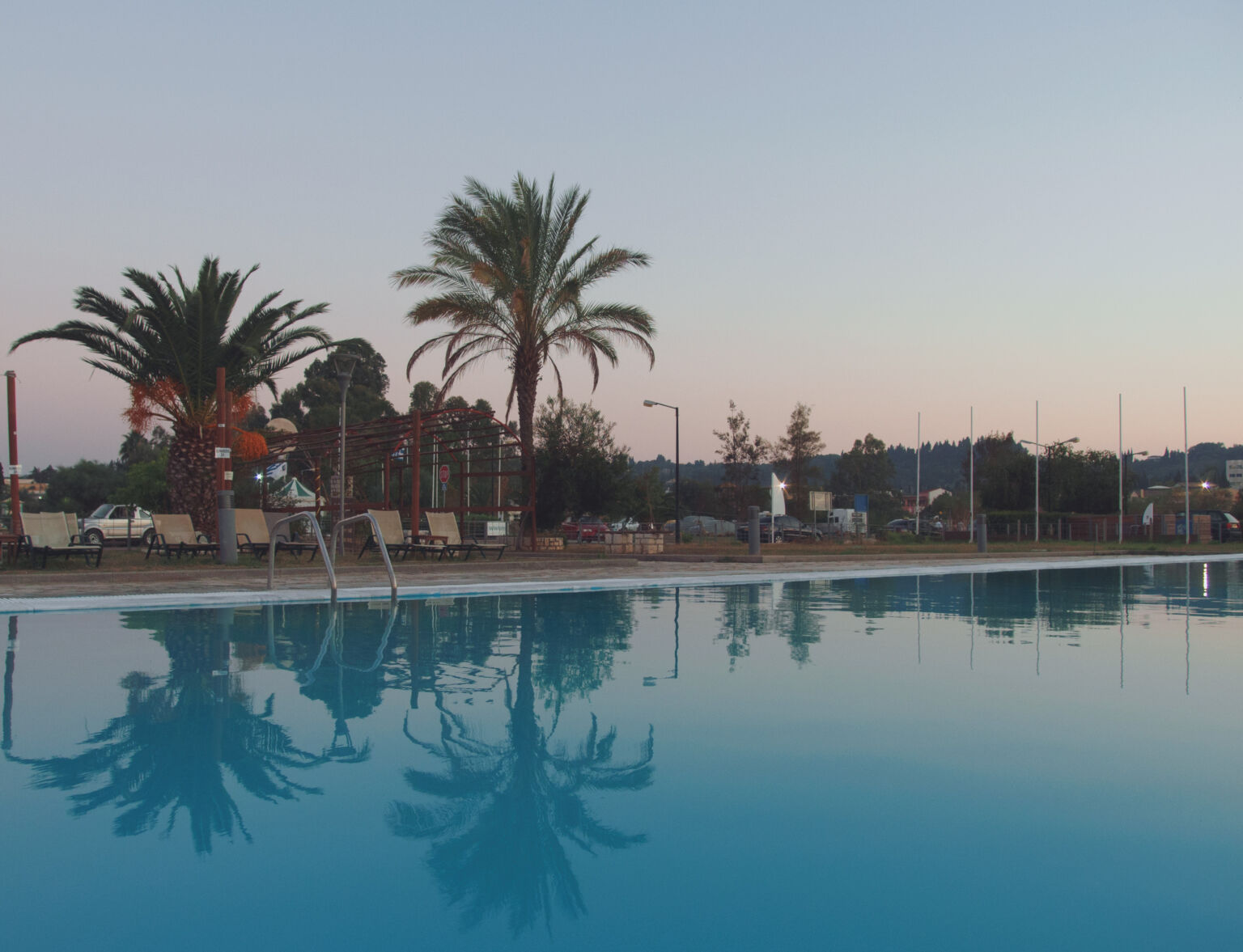 Swimming Pool And Palm Trees Copyright Free Photo By M Vorel