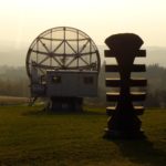 Statue and Radiotelescope Statue and Radiotelescope