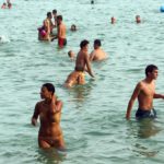 People in the Sea Bathing in the Sea