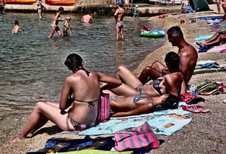 Sunbathing on the Beach Sunbathing on the Beach