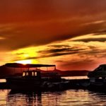 Red Sunset Over The Sea Boats