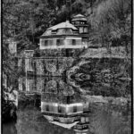 House reflected in water