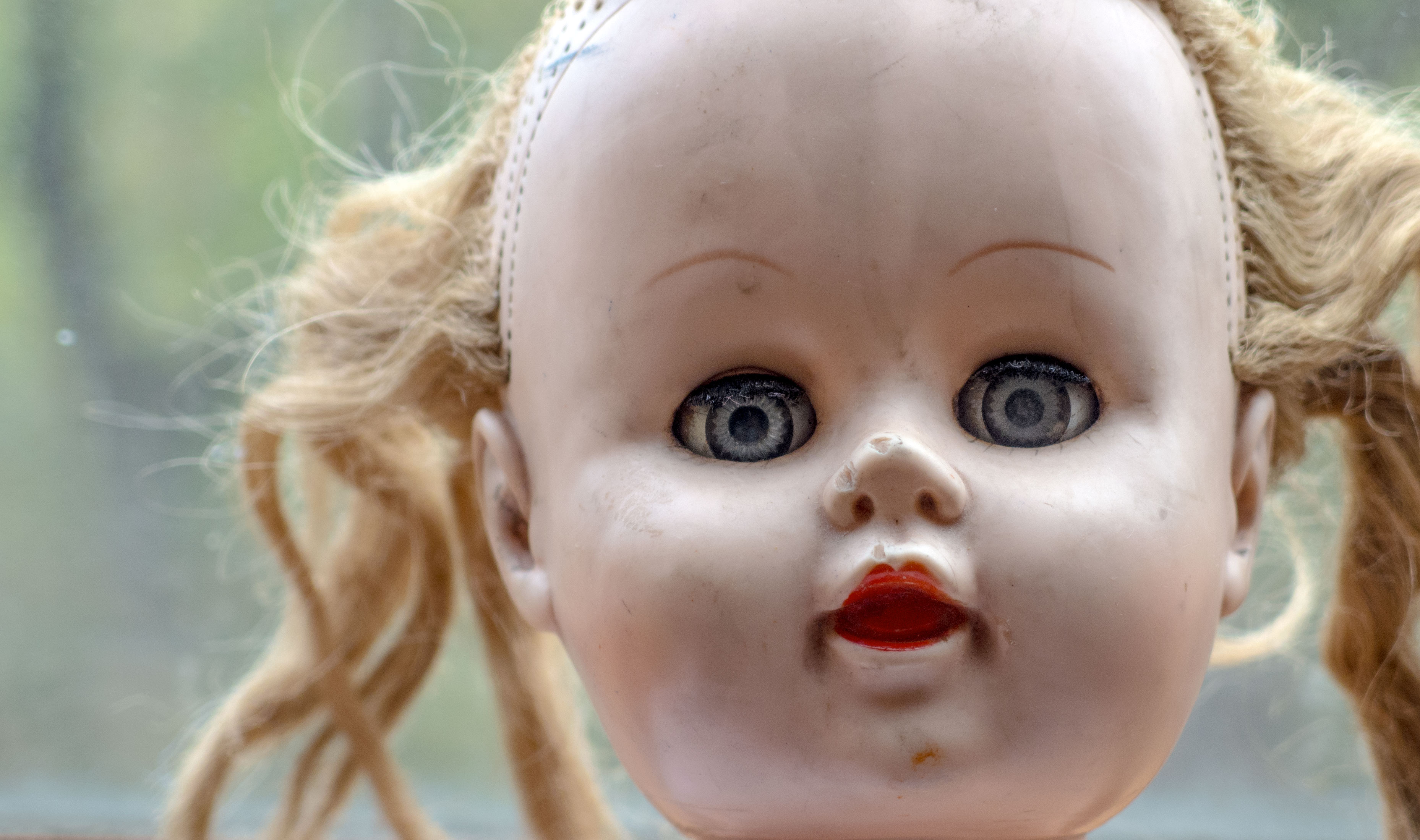 scary doll with big eyes