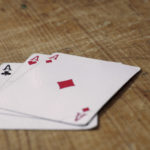 Three Aces Cards On Wooden Table Three Aces Cards On Wooden Table | Free stock photo