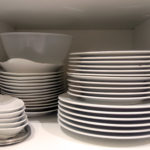 Dishes in cupboard in the kitchen