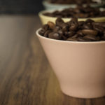 Coffee beans in small cups