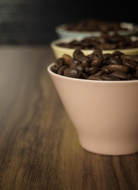 Coffee beans in small cups Coffee beans in small cups