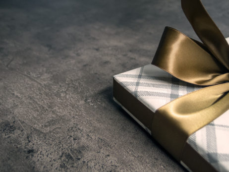 Gift with a golden bow Gift with a golden bow