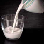 Milk is poured into a glass Free picture of milk is poured into a glass