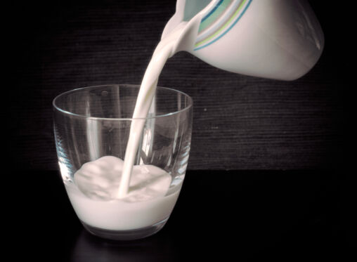 Milk is poured into a glass