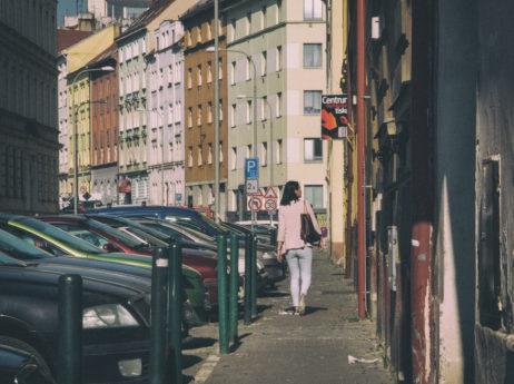 Girl walking on the street of Prague Girl walking on the street of Prague