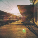 Photo of railway station at sunset