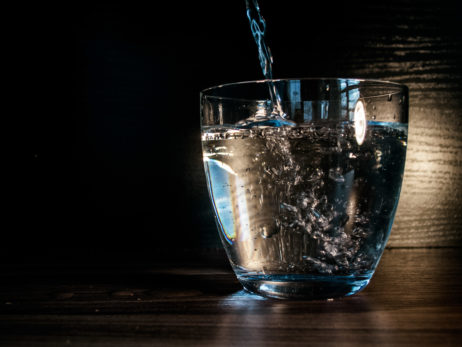 Water flows into the glass Water flows into the glass