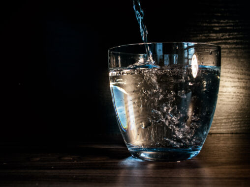 Water flows into the glass