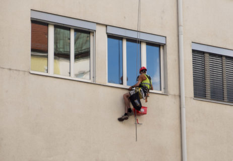 Window washer on a climbing rope Window washer on a climbing rope