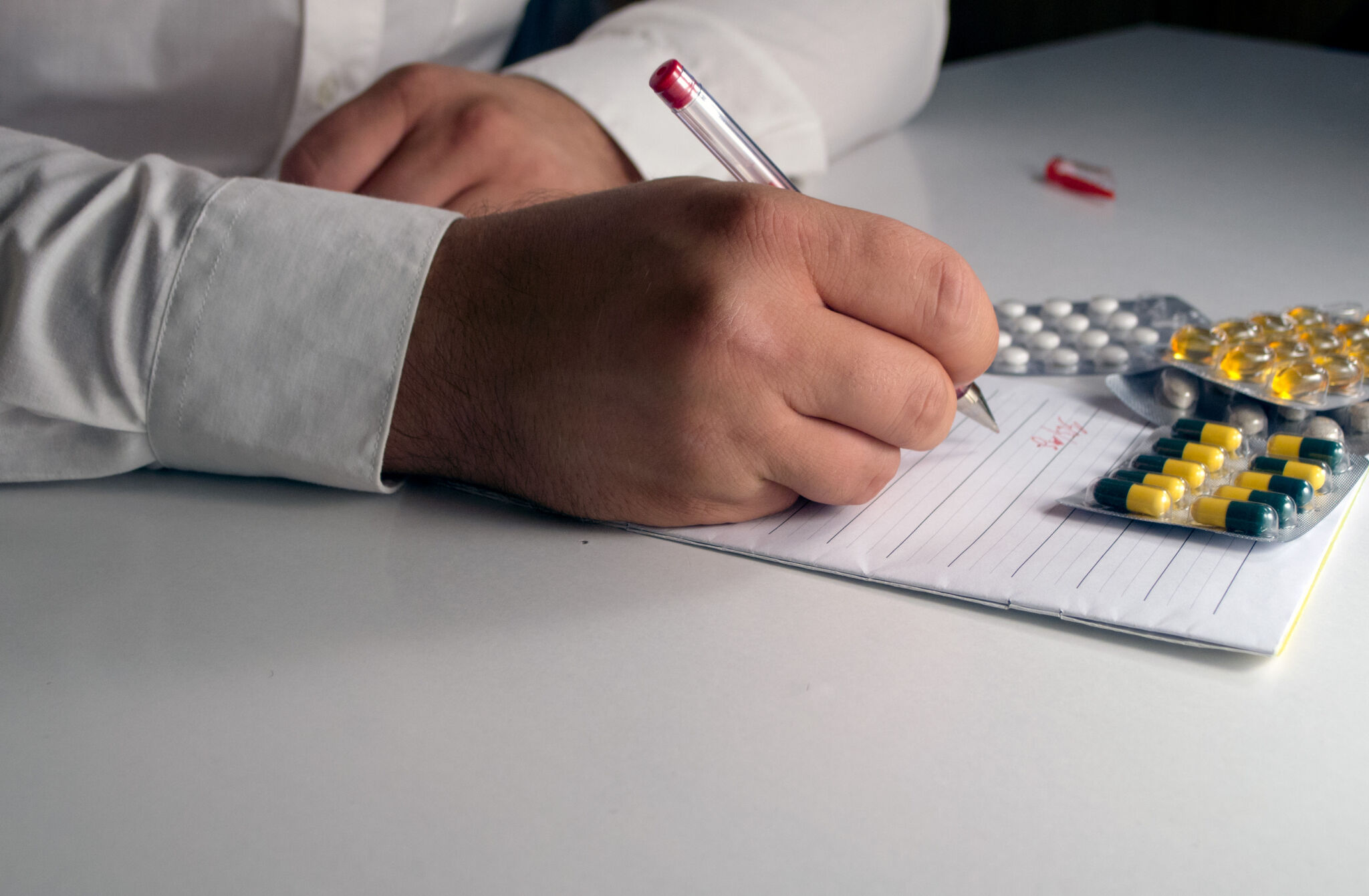 Doctor Writes A Prescription Copyright free Photo by M Vorel 