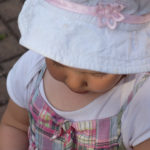 Little Girl In White Hat