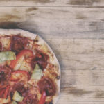 Pizza on Wooden Table Pizza on Wooden Table