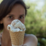 Girl Offering Ice Cream