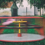 Kids On Children's Playground Carousel Kids On Children's Playground Carousel