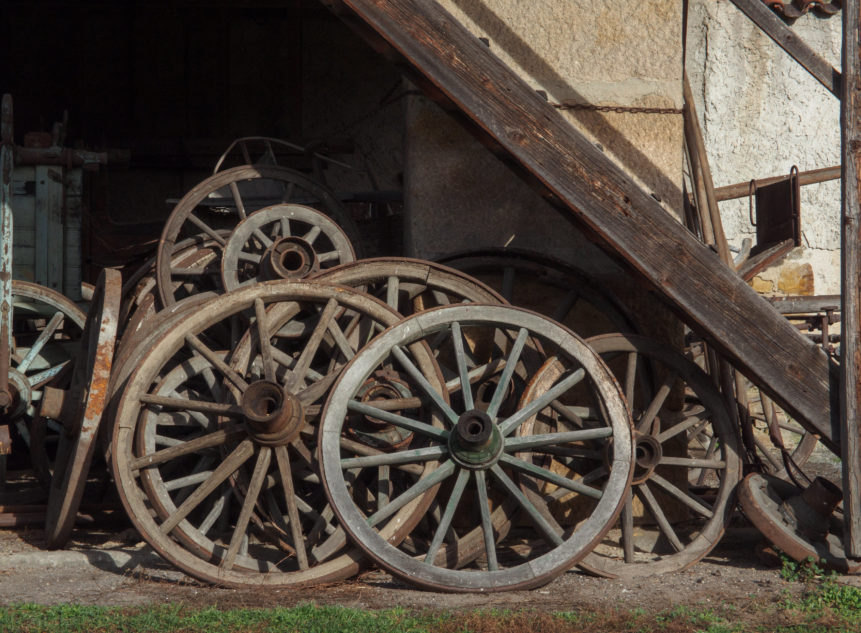 Wooden Wagon Wheels On Farm