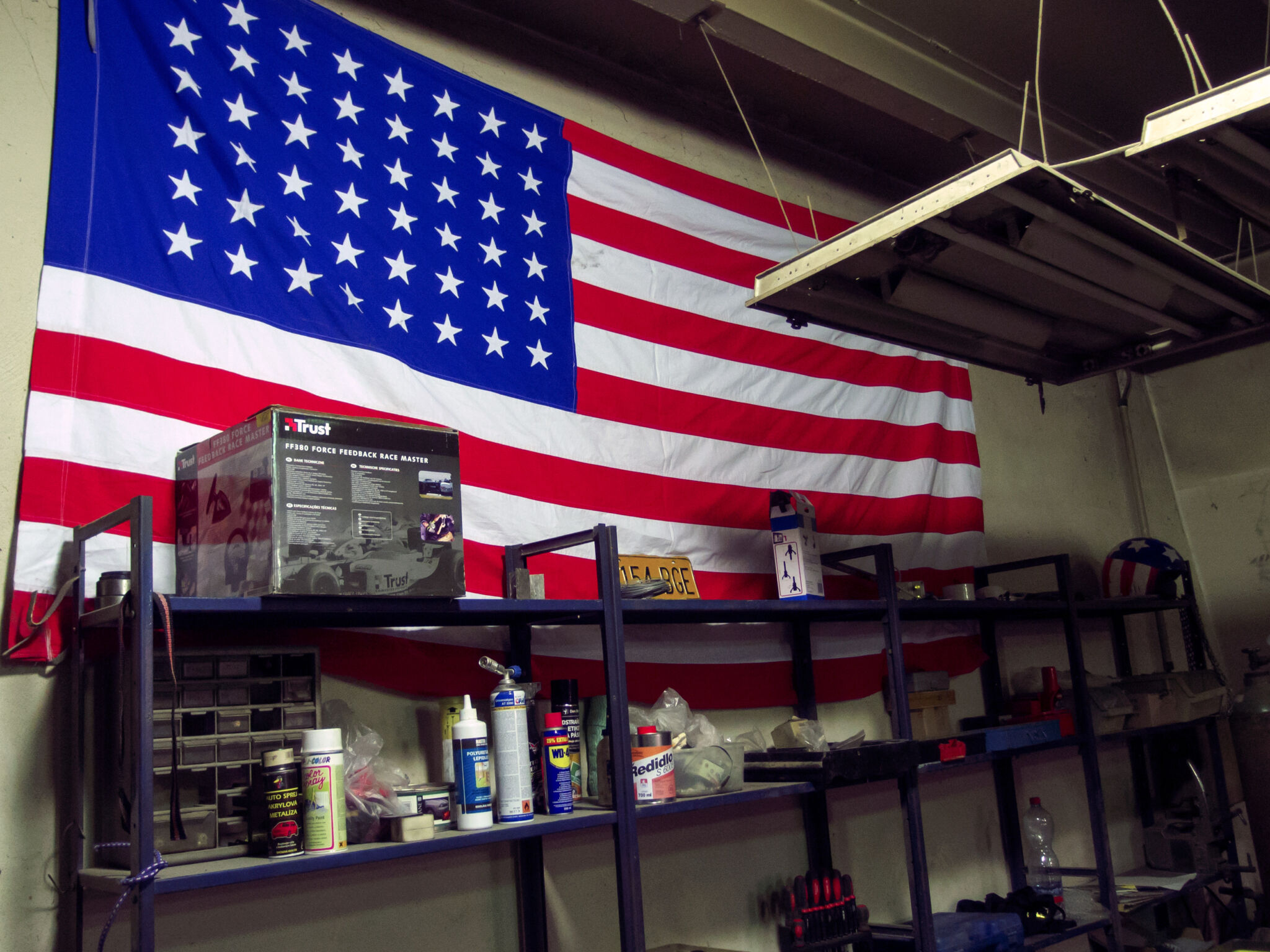 American Flag On The Wall Of Car Repair Shop Copyrightfree photo (by