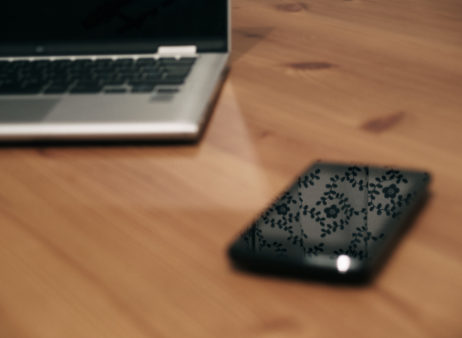 Laptop And Smartphone On Wooden Table Laptop And Smartphone On Wooden Table