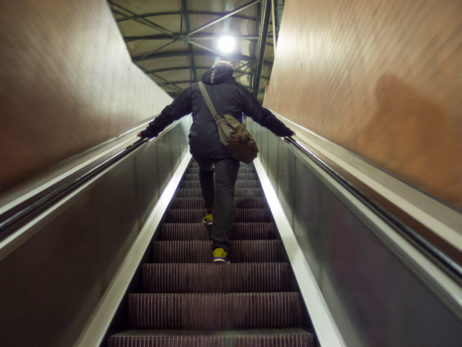 Man On Escalator In Tube Man On Escalator In Tube