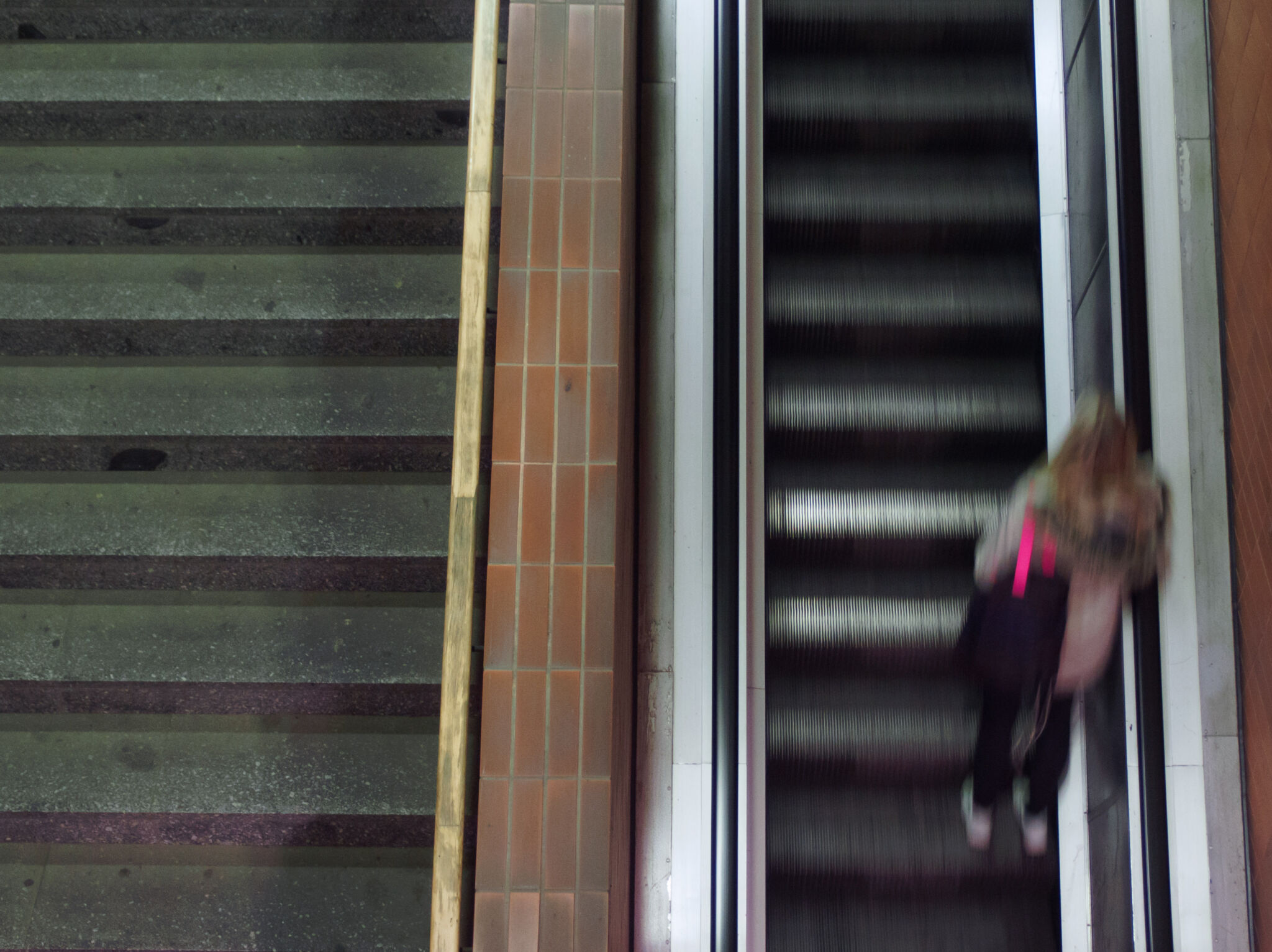 Woman On Moving Staircase | Free Stock Photo | LibreShot