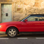 Red Car Cabrio With Grunge Wall Red Car Cabrio With Grunge Wall