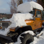 Off Road Jeep Car Covered With Snow