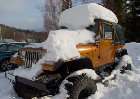 Off Road Jeep Car Covered With Snow Off Road Jeep Car Covered With Snow