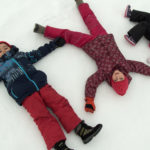 Three Siblings Children On The Snow