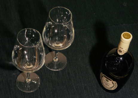 Two Glasses And Bottle Of Red Wine On Black Background Two Glasses And Bottle Of Red Wine On Black Background