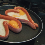 Valentine Food - Sausages In the Shape of a Heart With Eggs Valentine Food - Sausages In the Shape of a Heart With Eggs
