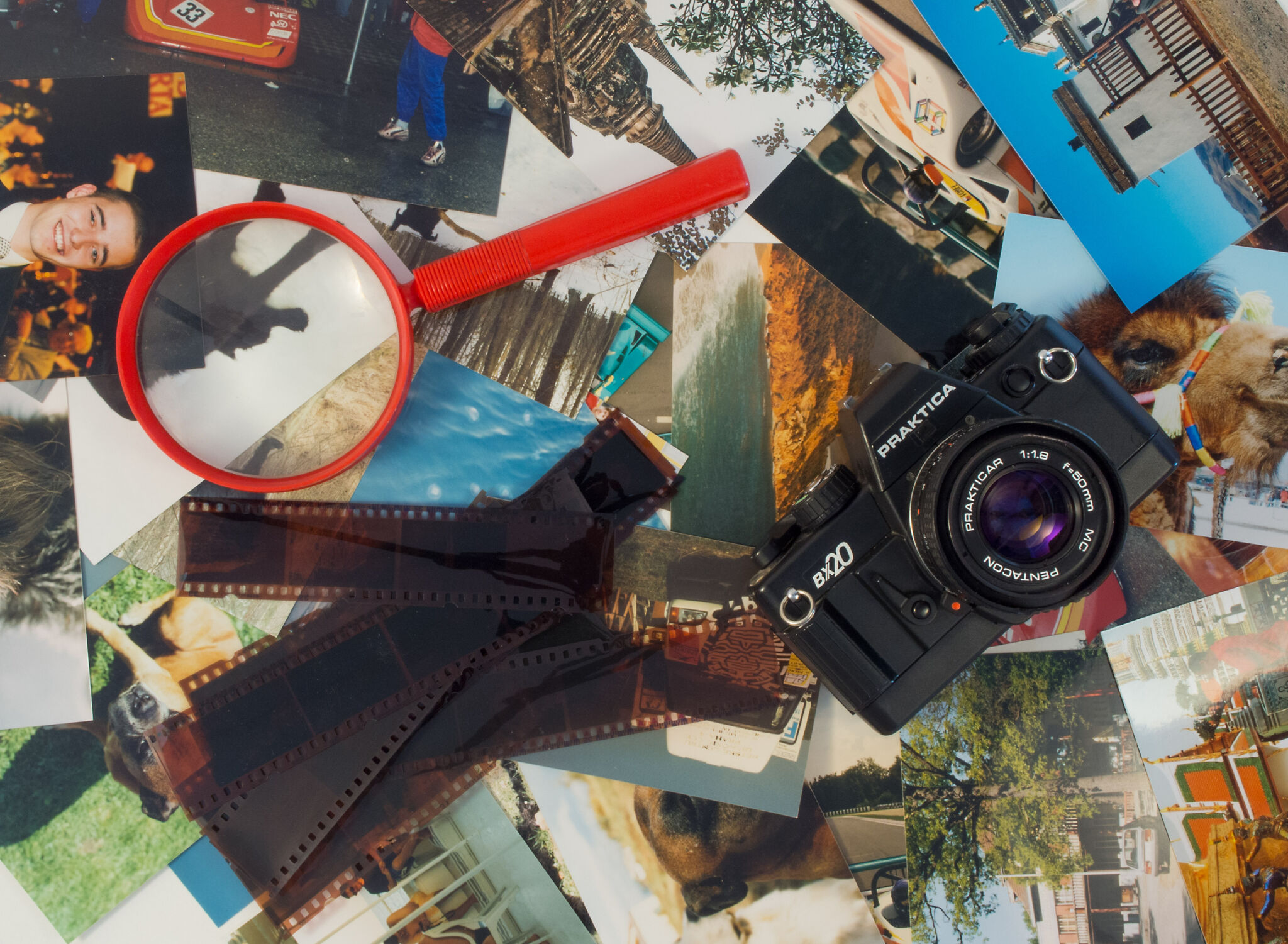 Photos, Camera, Film And Magnifier Copyrightfree photo (by M. Vorel