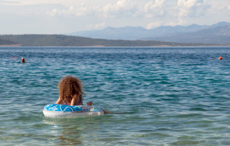 A Girl On Inflatable Ring In The Sea A Girl On Inflatable Ring In The Sea