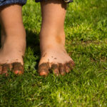 Muddy children feet