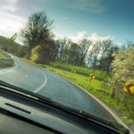 View from a fast-moving car in the curve View from a fast-moving car in the curve