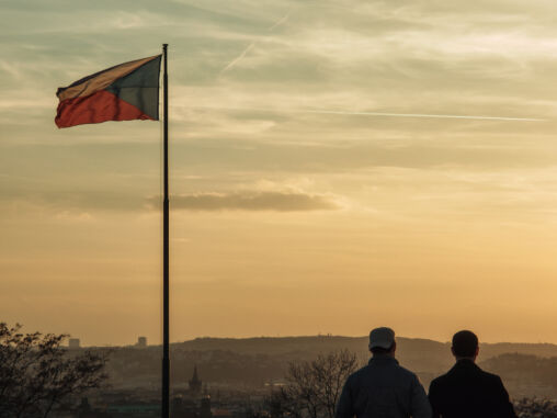 Two men looking to Prague