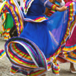 A dancers in a colorful dress A dancers in a colorful dress