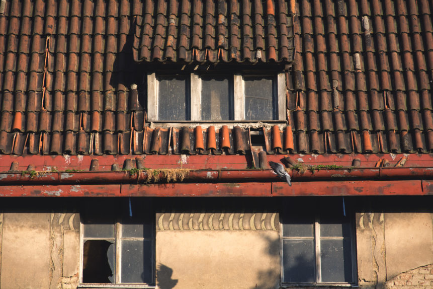 House with old roof and sunroof