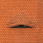 Old Dormer Window On Tiled Roof Old dormer window on tiled roof