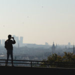 Man shooting cityscape