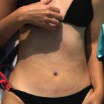 woman body black bikini