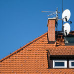 Satellite antenna dish on the roof