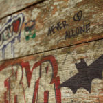 Graffiti on a wooden table Graffiti on a wooden table