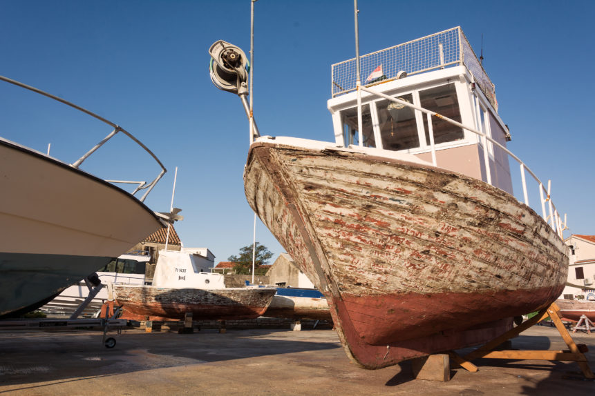 An old fishing boat in dry dock