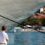 man with luxury yacht