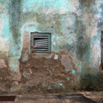 old blue wall and windows